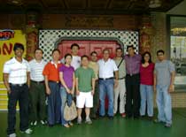 Group of people posing for camera